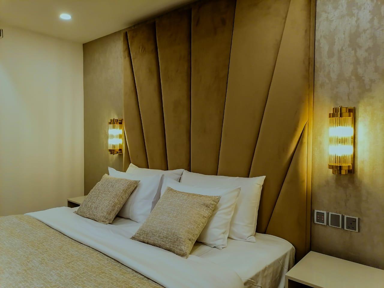 Master bedroom with modern furnishings in executive apartment Colombo 7