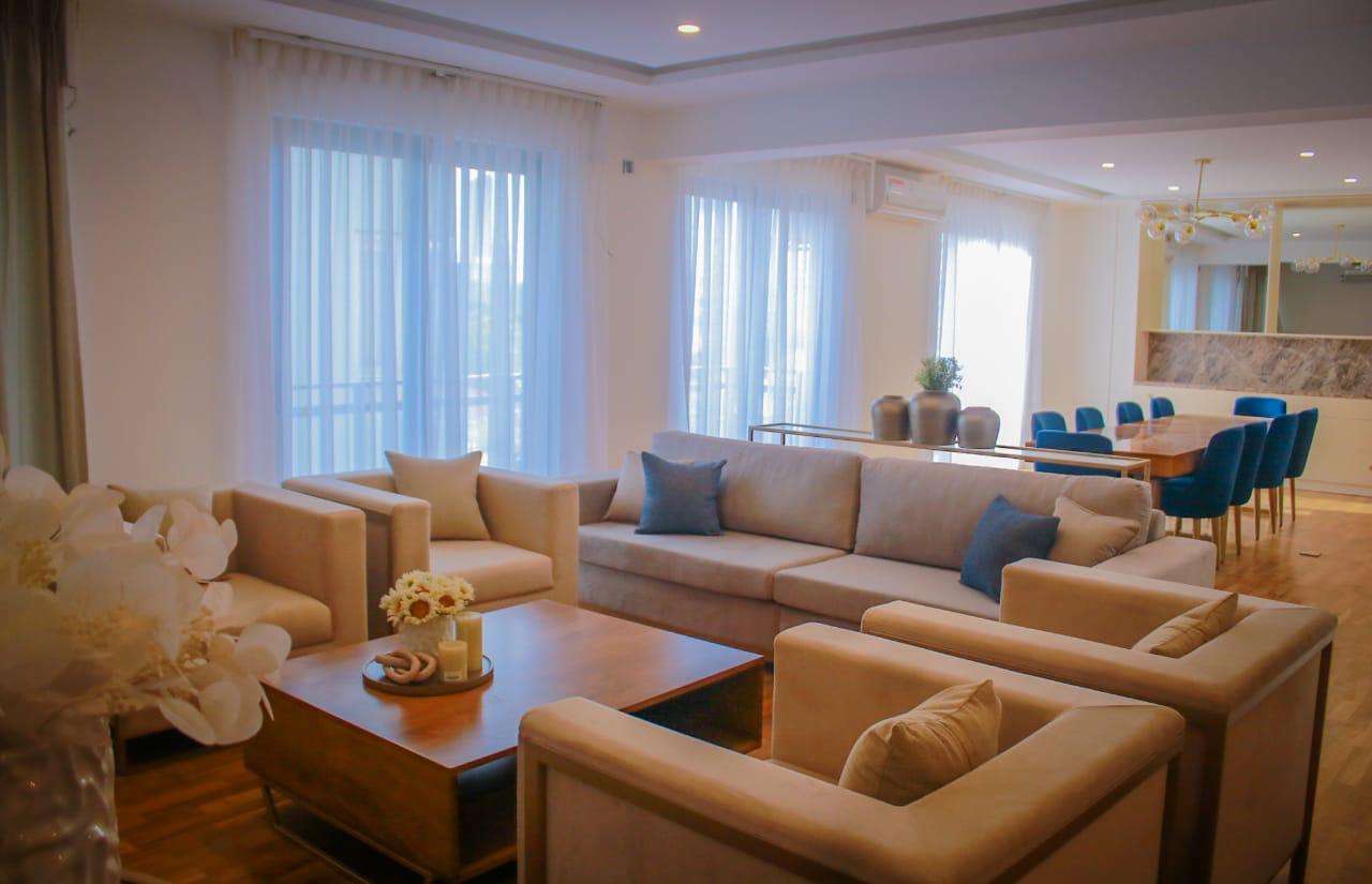 Luxurious penthouse living room with modern furnishings at C7